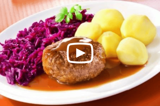 Finance4Learning _ Traditional Dutch Cuisine called Gehaktballen En Rode Kool Met Aardappelen En Jus